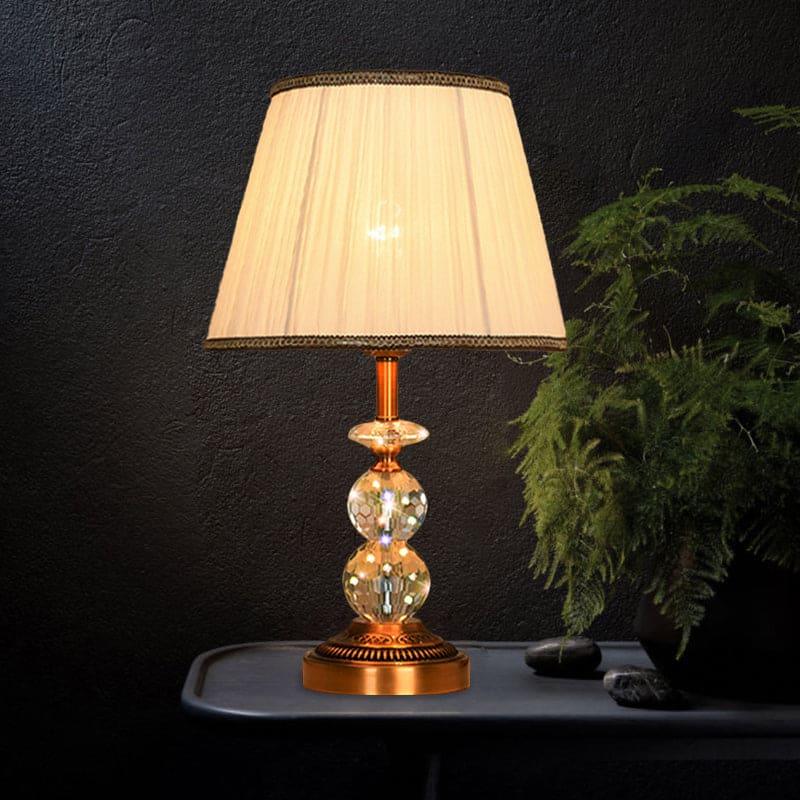 SculpturalShine – Lampada da tavolo con sfera di cristallo dall'eleganza raffinata