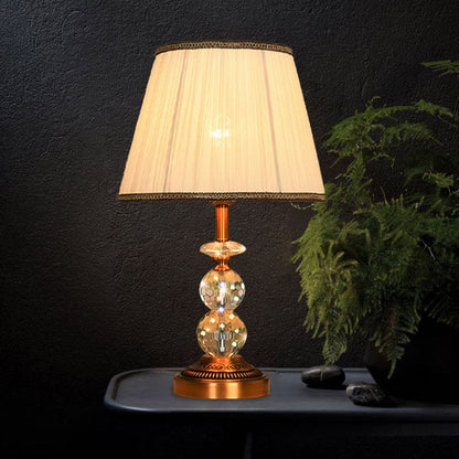 SculpturalShine – Lampada da tavolo con sfera di cristallo dall'eleganza raffinata