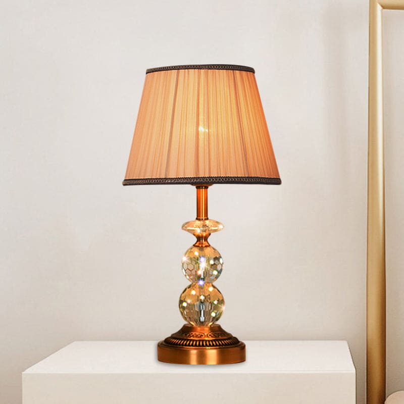 SculpturalShine – Lampada da tavolo con sfera di cristallo dall'eleganza raffinata
