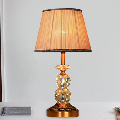 SculpturalShine – Lampada da tavolo con sfera di cristallo dall'eleganza raffinata