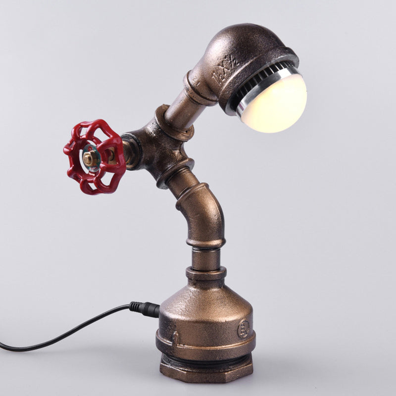 SteamGlow – Lampada robot in ottone con interruttore rotante