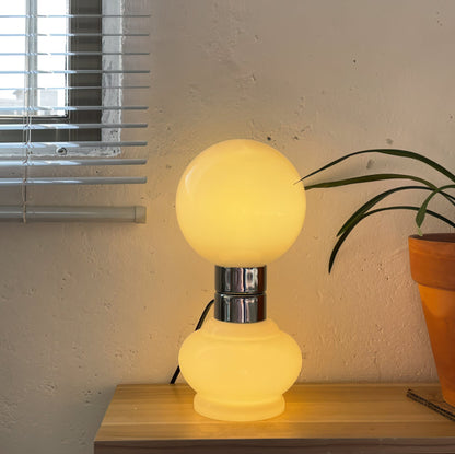 GlobeLume – Sleek White Glass Lamp Design