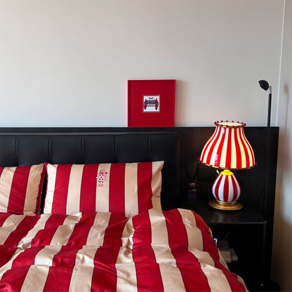 JollyGlow - Bordlampe med cirkuselementer og livlig belysning