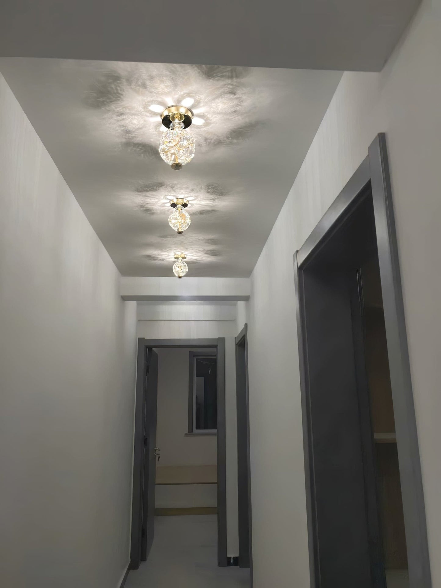 CrystalGlobe - Lampe de plafond avec sphère en cristal poli et design classique