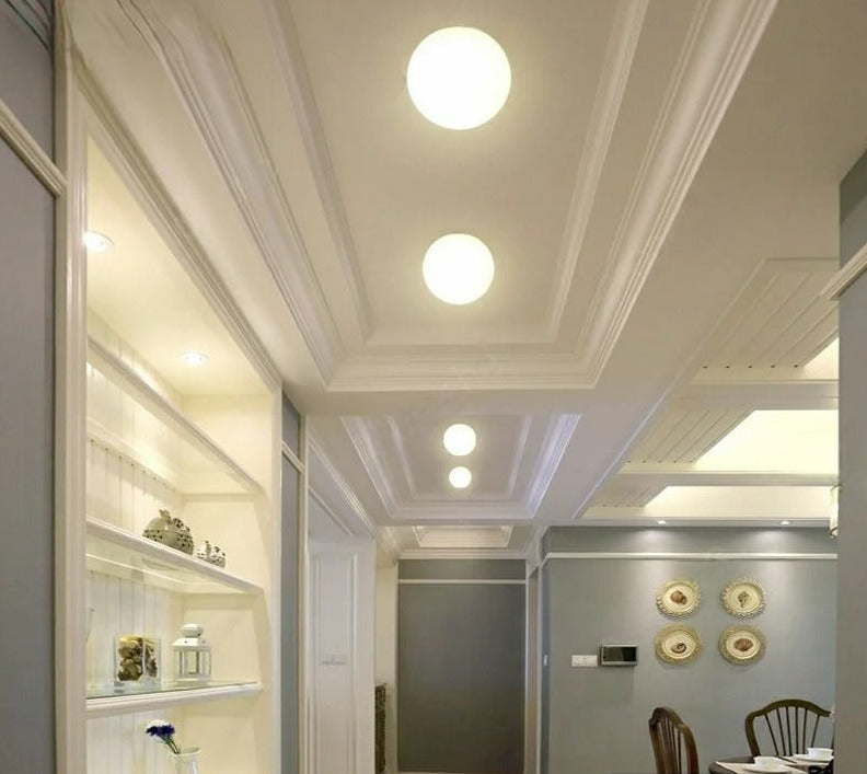 GlaciaLuxe – Minimalist Wall Lamp with Glass Stone Design