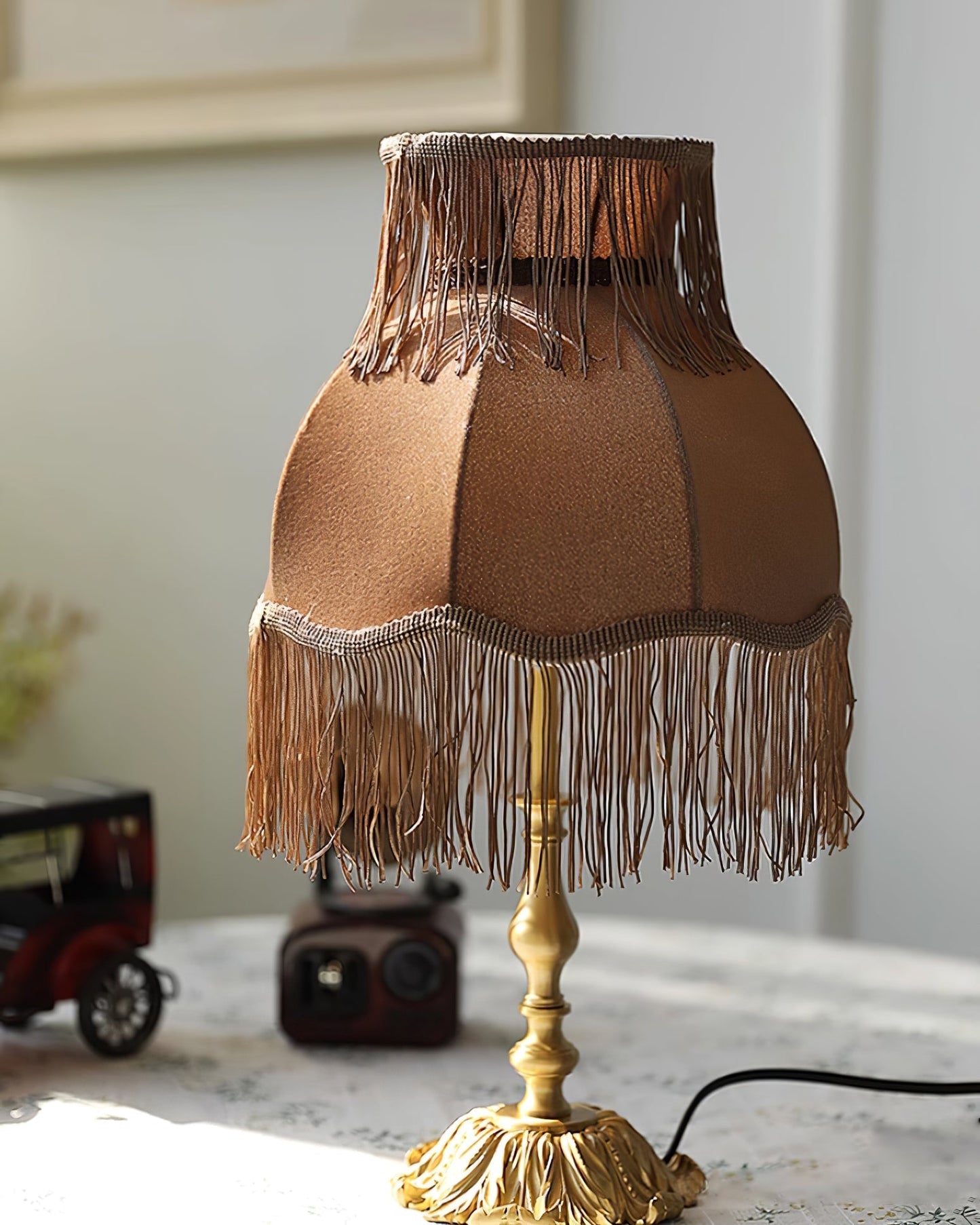ElegantFringe – Modern Brass Lamp with Tassels