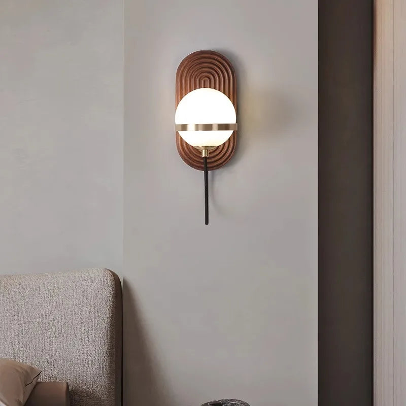 LuxeSphere – Chic Walnut Wall Lamp in Spherical Form