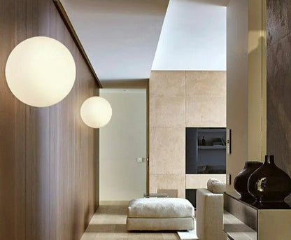 GlaciaLuxe – Minimalist Wall Lamp with Glass Stone Design