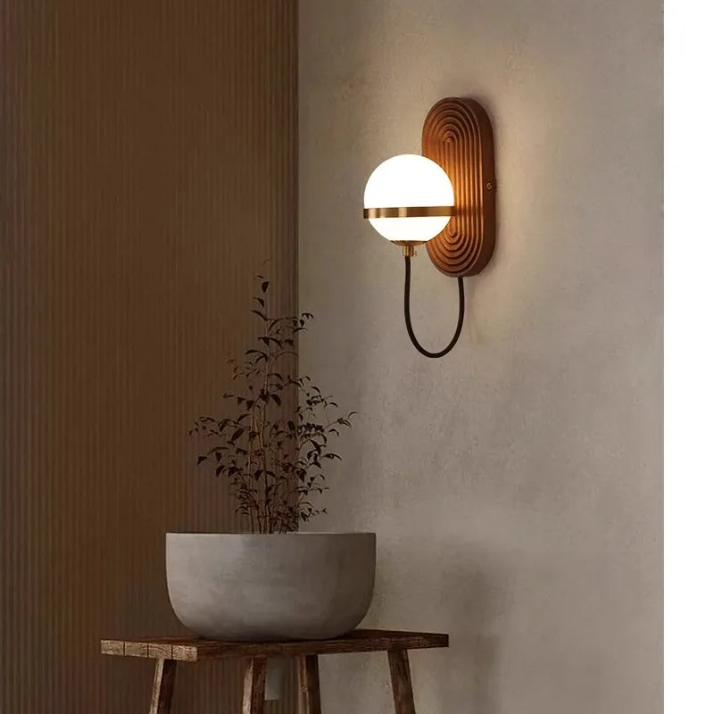 LuxeSphere – Chic Walnut Wall Lamp in Spherical Form