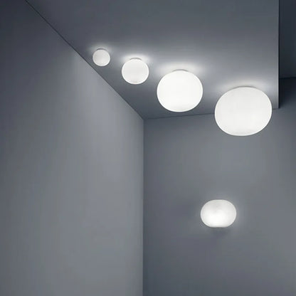 GlaciaLuxe – Minimalist Wall Lamp with Glass Stone Design