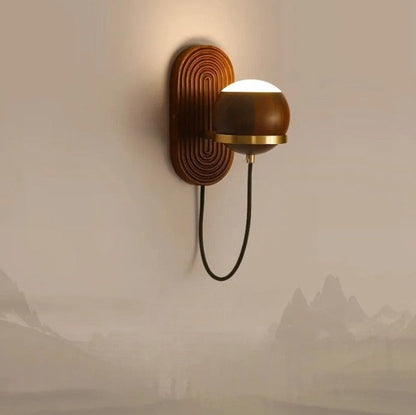 LuxeSphere – Chic Walnut Wall Lamp in Spherical Form