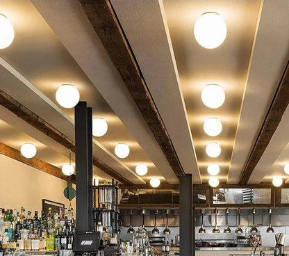 GlaciaLuxe – Minimalist Wall Lamp with Glass Stone Design